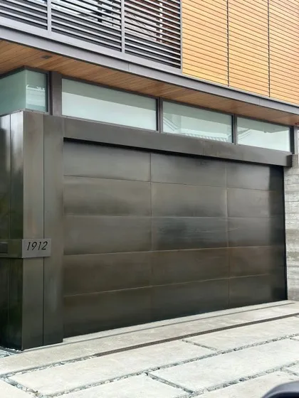 Dark wood-look modern garage door installation in Orange County